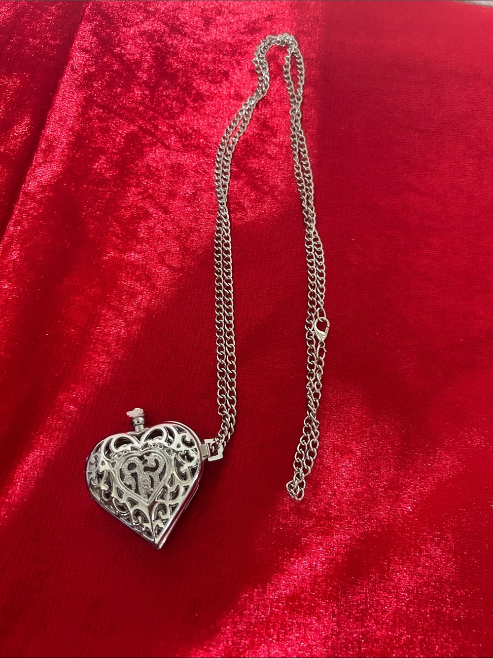Brand new — never worn
Heart-shaped pendant watch